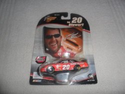 2005 Nascar Winner's Circle . . . Tony Stewart 20 The Home Depot Chevy Monte Carlo 1 64 Diecast . . . Includes 1 24 Scale Hood Magne
