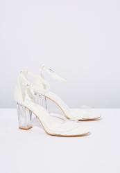 white and perspex heels
